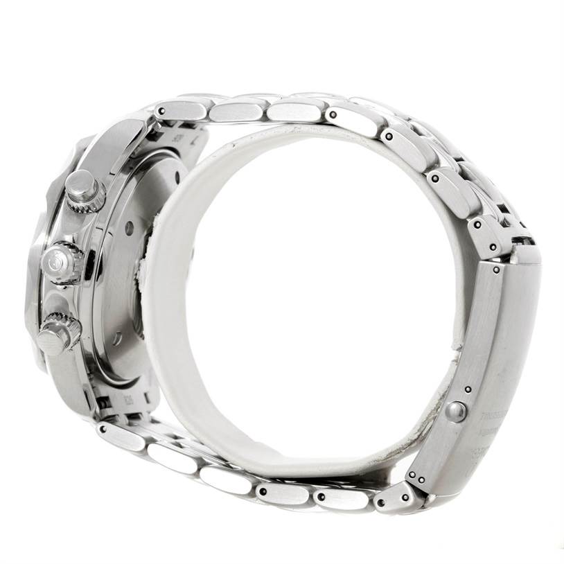 The image shows a side view of the Omega Seamaster 2599.80.00 Men
s Stainless Steel Blue Dial 2599.80.00 Men
s Stainless Steel Blue Dial watch, highlighting the crown, pushers, and stainless steel bracelet.