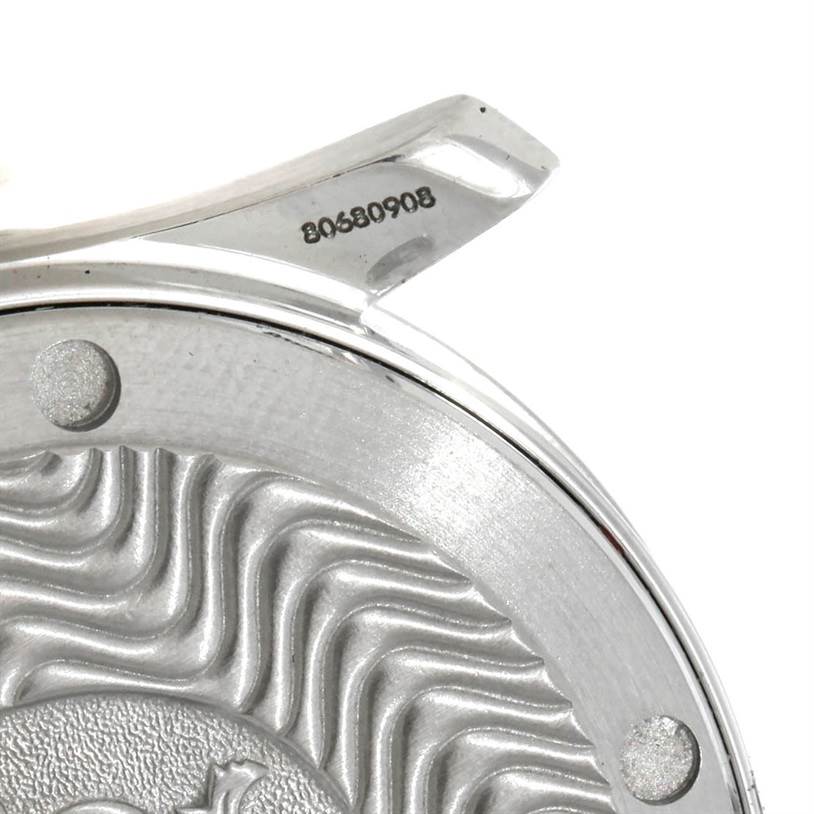 This image shows a close-up of the case back and part of the lug with the serial number of the Omega Seamaster 2252.50.00 Men
s Stainless Steel Black Dial 2252.50.00 Men
s Stainless Steel Black Dial watch.