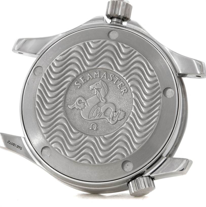 The image shows the back case and crown of an Omega Seamaster 2561.80.00 Men
s Stainless Steel Blue Dial 2561.80.00 Men
s Stainless Steel Blue Dial watch with an engraved wave pattern and emblem.