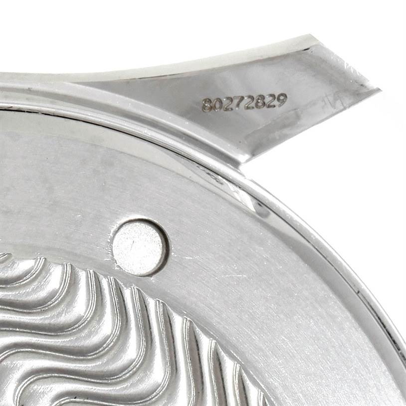 This close-up image shows the lug and part of the caseback of an Omega Seamaster 2531.80.00 Men
s Stainless Steel Blue Dial 2531.80.00 Men
s Stainless Steel Blue Dial watch, featuring its serial number.