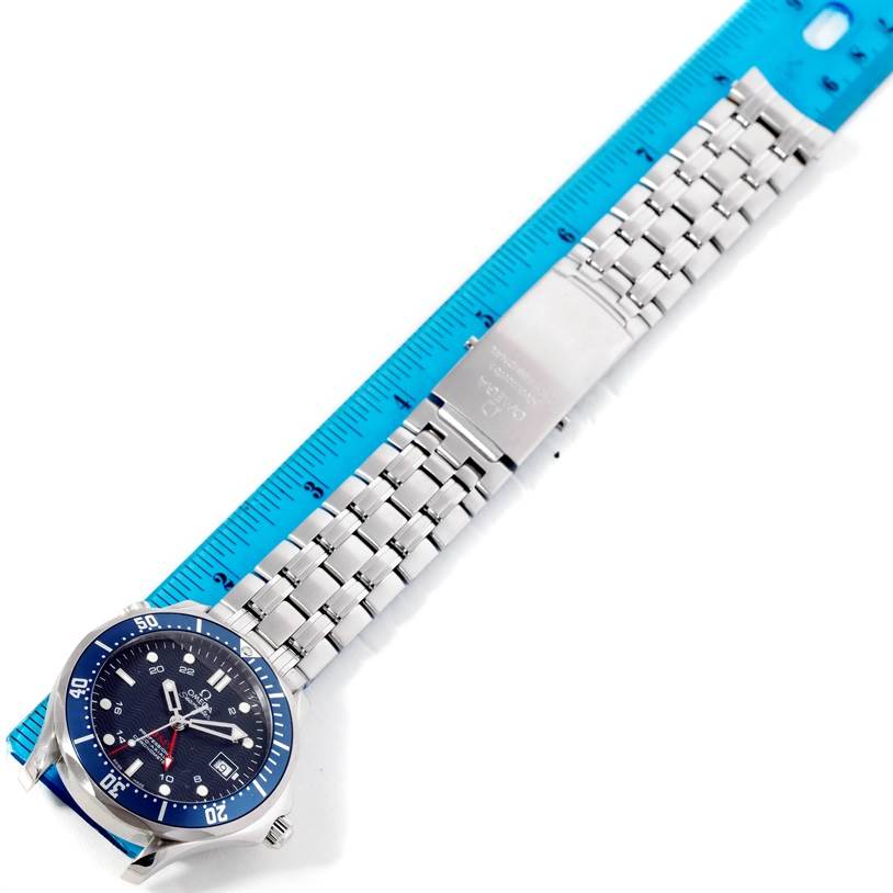 The image shows the dial, bezel, and metal bracelet of an Omega Seamaster 2535.80.00 Men
s Stainless Steel Blue Dial 2535.80.00 Men
s Stainless Steel Blue Dial watch, measured with a blue ruler.