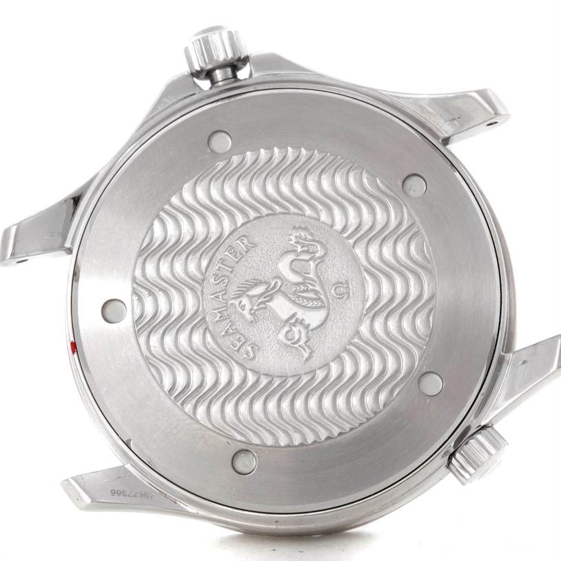 The image shows the back case and crown of an Omega Seamaster 2531.80.00 Men's Stainless Steel Blue Dial 2531.80.00 Men's Stainless Steel Blue Dial watch, highlighting its intricate engraving and logo.