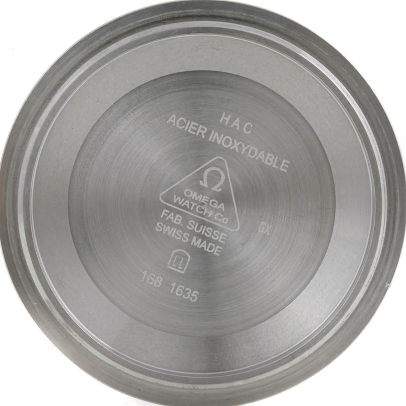 This is the inside of a case back for an Omega Seamaster 212.30.41.20.01.001 Men
s Stainless Steel Black Dial 212.30.41.20.01.001 Men
s Stainless Steel Black Dial watch, showing the Omega logo and model information.