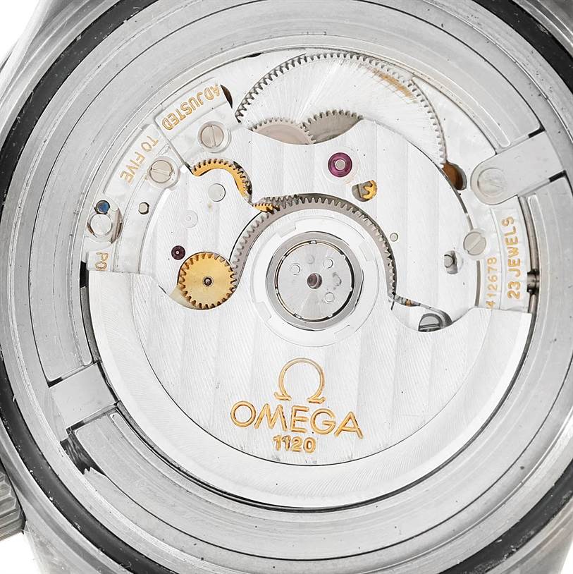 This image shows the internal mechanism and movement of an Omega Seamaster 2231.80.00 Men's Titanium Blue Dial 2231.80.00 Men's Titanium Blue Dial watch from a close-up angle.