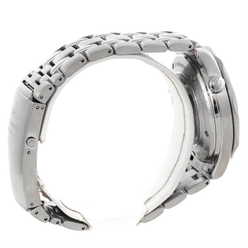 The image shows a side view of an Omega Seamaster 2535.80.00 Men's Stainless Steel Blue Dial 2535.80.00 Men's Stainless Steel Blue Dial watch, focusing on the stainless steel bracelet and the case back.