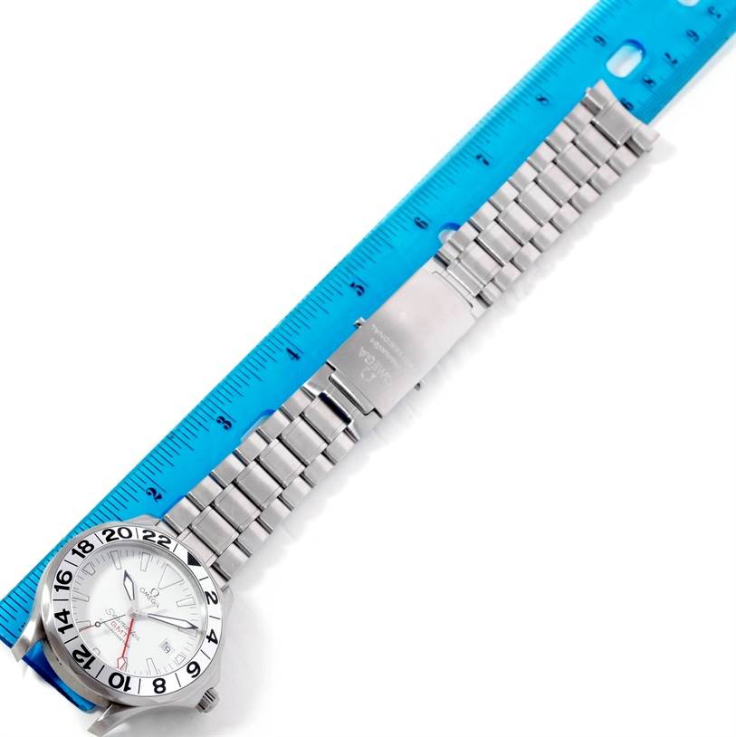 The image shows an Omega Seamaster 2538.20.00 Men's Stainless Steel White Dial 2538.20.00 Men's Stainless Steel White Dial watch laid flat with the metal bracelet and clasp clearly visible next to a blue ruler.