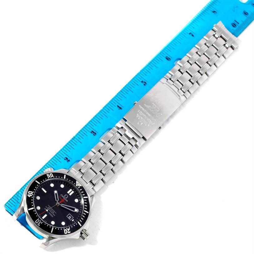 The image shows an Omega Seamaster 212.30.41.20.01.001 Men
s Stainless Steel Black Dial 212.30.41.20.01.001 Men
s Stainless Steel Black Dial watch laid flat with its metal bracelet extended next to a ruler.