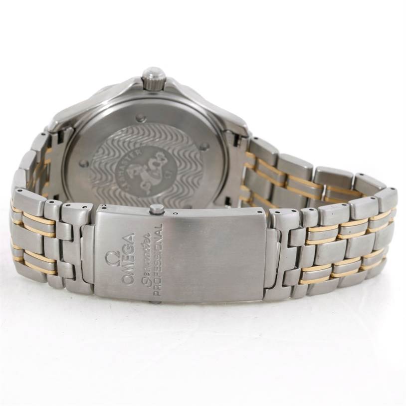 The image shows the back and clasp of an Omega Seamaster 2455.80.00 Men
s Stainless Steel Blue Dial 2455.80.00 Men
s Stainless Steel Blue Dial wristwatch, highlighting the stainless steel and gold-plated bracelet.