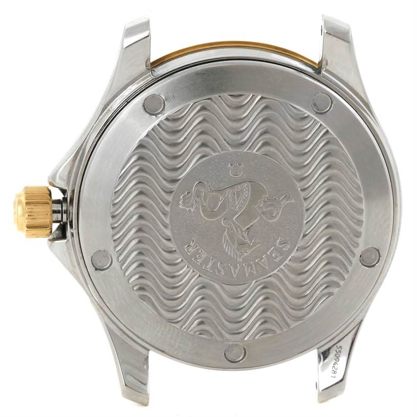 This image shows the back case and crown of an Omega Seamaster 2311.21.00 Men's Steel and Gold (two tone) White Dial 2311.21.00 Men's Steel and Gold (two tone) White Dial watch from a top-down angle.