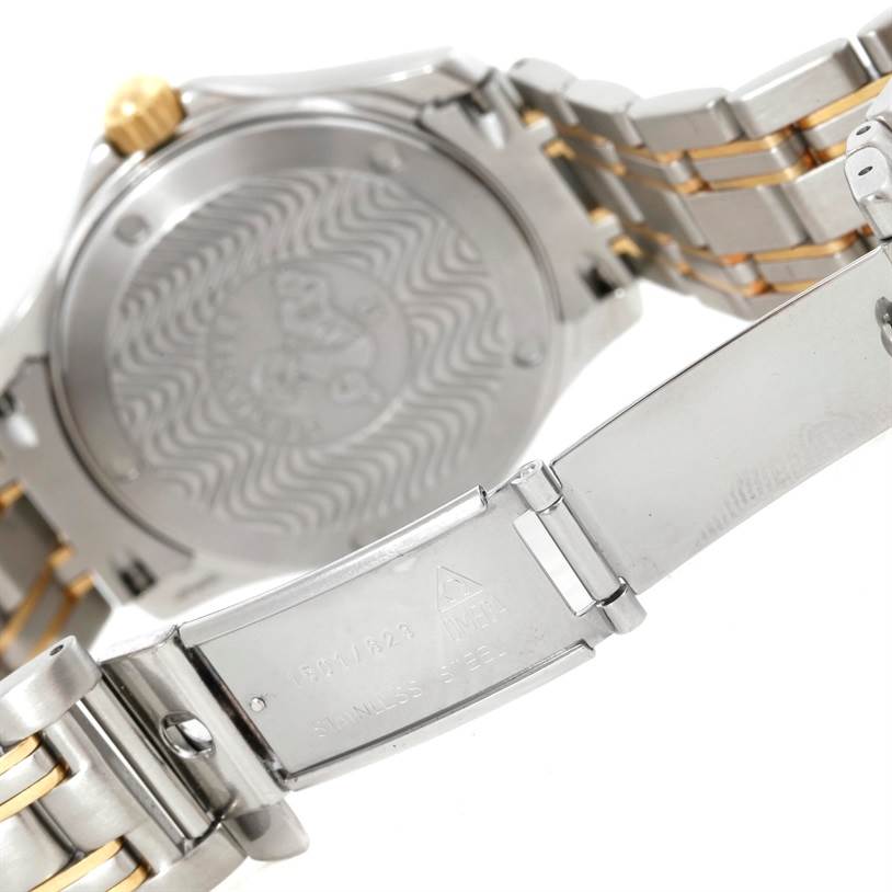 The image shows the backside and clasp of an Omega Seamaster 2311.21.00 Men's Steel and Gold (two tone) White Dial 2311.21.00 Men's Steel and Gold (two tone) White Dial watch at an angled rear view.