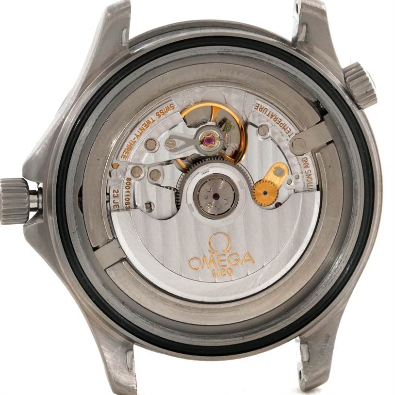 The image shows the back view of the Omega Seamaster 2031.50.00 Men's Titanium Black Dial 2031.50.00 Men's Titanium Black Dial watch, revealing its inner mechanical movement and components.