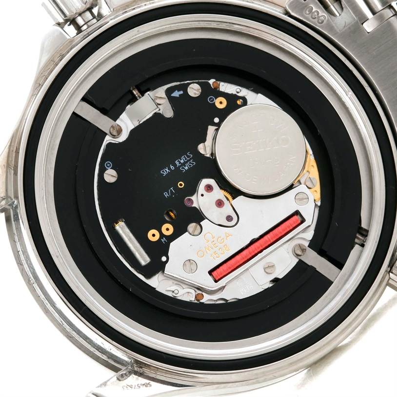 The image shows the internal mechanism and battery of an Omega Seamaster 2264.50.00 Men's Stainless Steel Black Dial 2264.50.00 Men's Stainless Steel Black Dial watch, viewed from the back with the case opened.