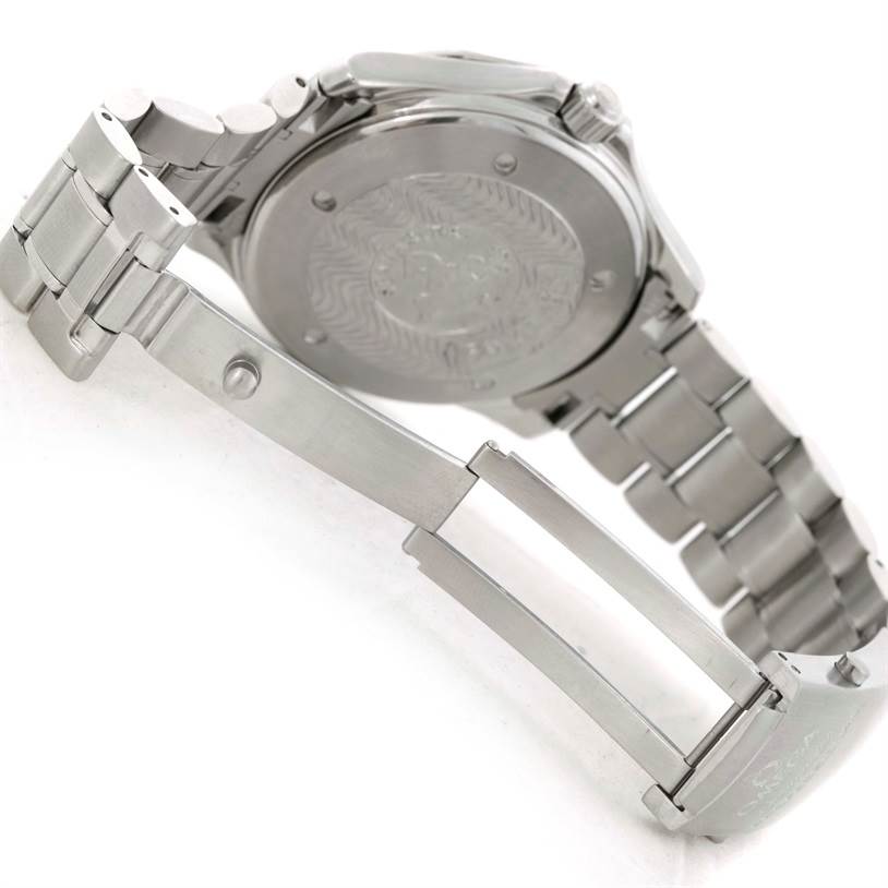 The image shows the case back and partially opened bracelet of an Omega Seamaster 2534.50.00 Men
s Stainless Steel Black Dial 2534.50.00 Men
s Stainless Steel Black Dial watch from a side angle.