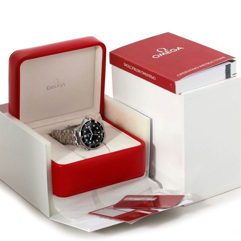 The Omega Seamaster 212.30.41.20.01.002 Men
s Stainless Steel Black Dial 212.30.41.20.01.002 Men
s Stainless Steel Black Dial watch is shown inside its open red case, alongside operating instructions and warranty cards.
