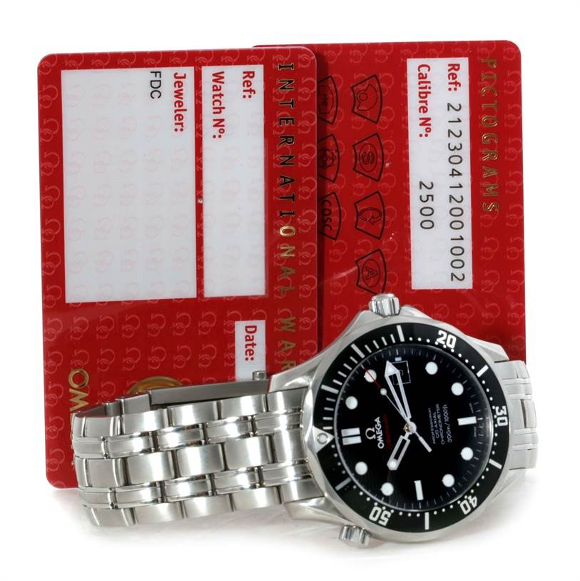 The Omega Seamaster 212.30.41.20.01.002 Men
s Stainless Steel Black Dial 212.30.41.20.01.002 Men
s Stainless Steel Black Dial watch is shown from a three-quarter angle with its accompanying warranty cards in the background.