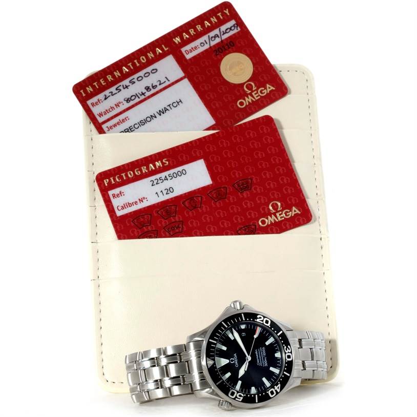 The image shows an Omega Seamaster 2254.50.00 Men
s Stainless Steel Black Dial 2254.50.00 Men
s Stainless Steel Black Dial watch at a slight angle, alongside its international warranty and pictograms cards in a holder.