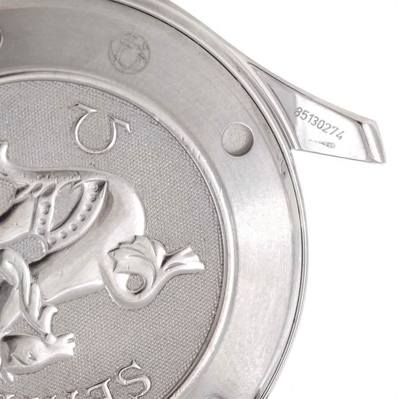 The image shows the detailed back case of an Omega Seamaster 2220.80.00 Men
s Stainless Steel Blue Dial 2220.80.00 Men
s Stainless Steel Blue Dial watch, showcasing its engravings and serial number.