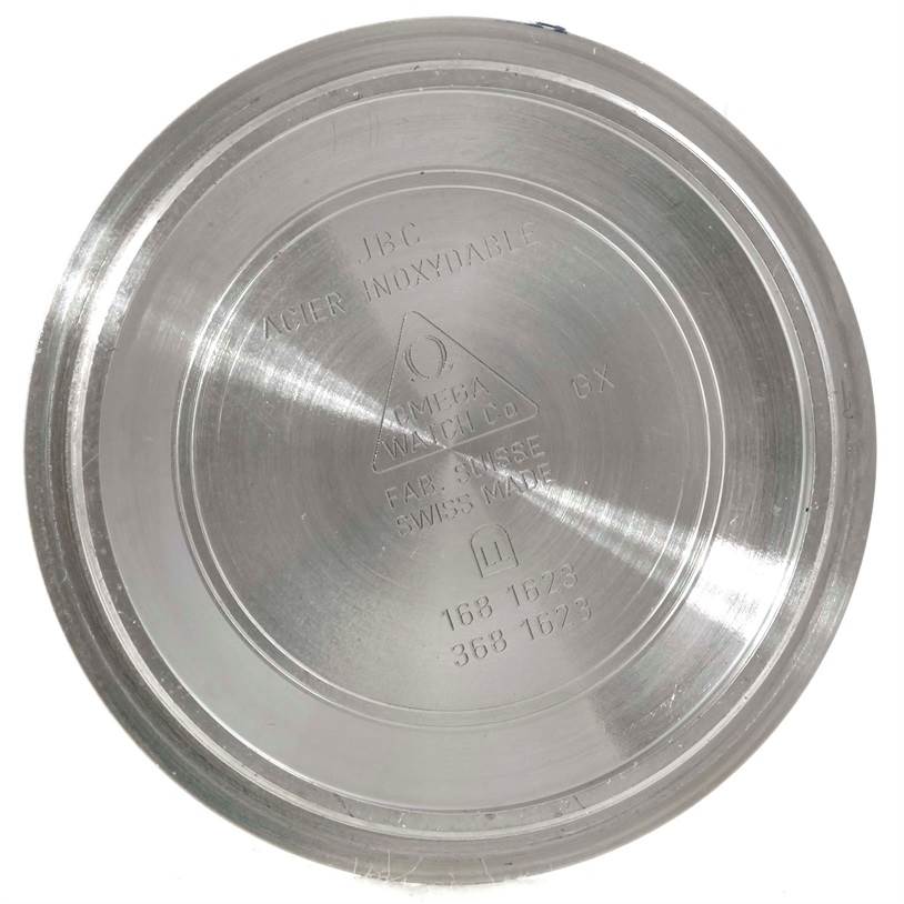 The image shows the back case of an Omega Seamaster 2531.80.00 Men
s Stainless Steel Blue Dial 2531.80.00 Men
s Stainless Steel Blue Dial watch, photographed from a top-down angle.