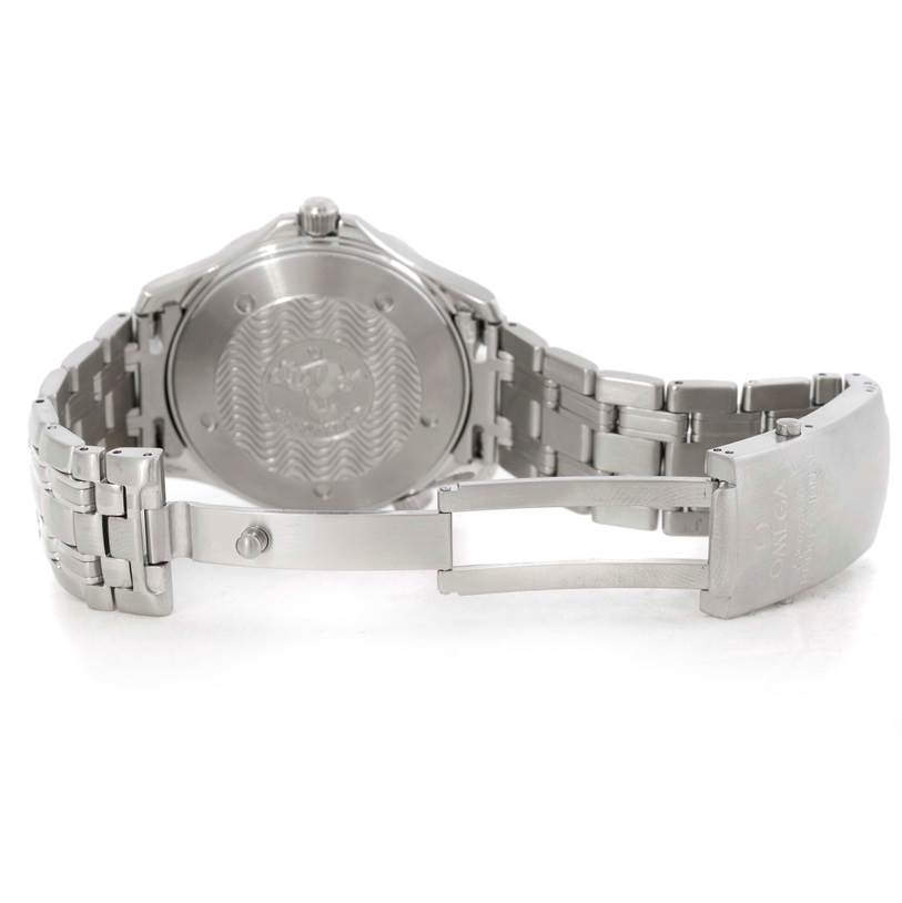 The image shows the back and clasp of an Omega Seamaster 2264.50.00 Men
s Stainless Steel Black Dial 2264.50.00 Men
s Stainless Steel Black Dial watch at an angle highlighting its stainless steel bracelet and engraved case back.