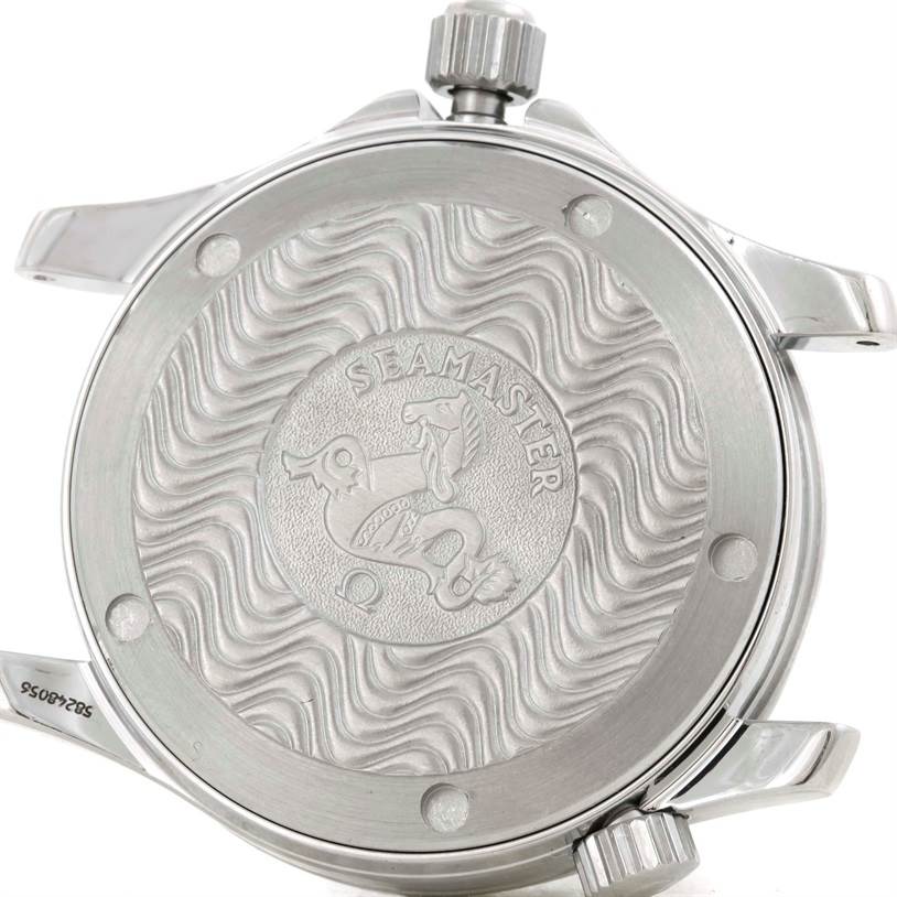 The image shows the back case of an Omega Seamaster 2262.50.00 Men
s Stainless Steel Black Dial 2262.50.00 Men
s Stainless Steel Black Dial watch, displaying the engraved logo and wave design.