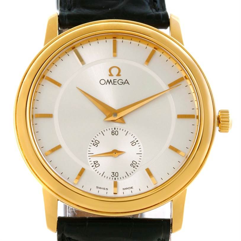 The image shows a front view of an Omega De Ville 4620.31 Men's Yellow Gold Silver Dial 4620.31 Men's Yellow Gold Silver Dial watch, highlighting its gold case, dial, hands, and subdial.