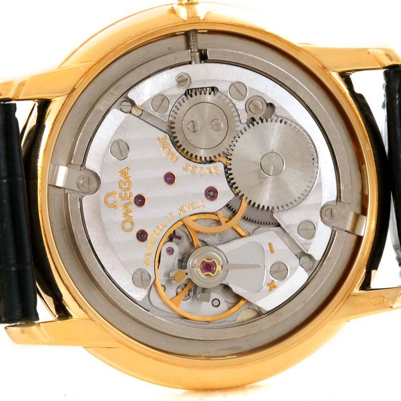 This image shows a close-up view of the movement and inner workings of an Omega De Ville 4620.31 Men's Yellow Gold Silver Dial 4620.31 Men's Yellow Gold Silver Dial watch from the back.