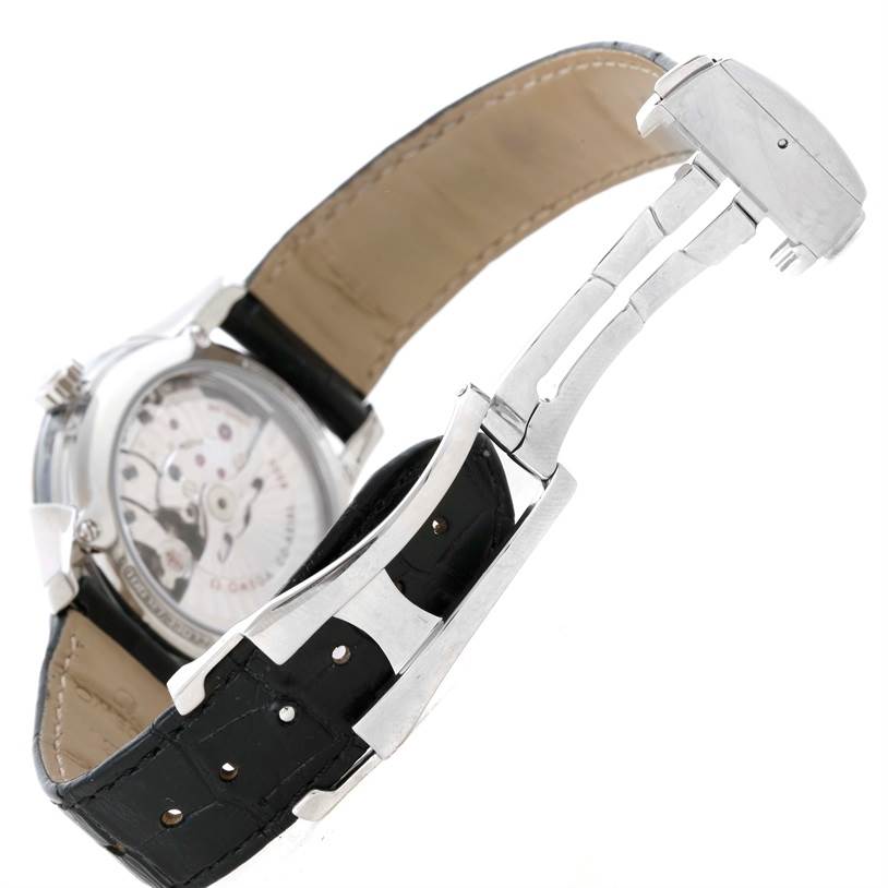 This image shows the underside and clasp mechanism of the Omega De Ville 431.33.41.21.03.001 Men's Stainless Steel Blue Dial 431.33.41.21.03.001 Men's Stainless Steel Blue Dial watch with its open leather strap and exposed movement.