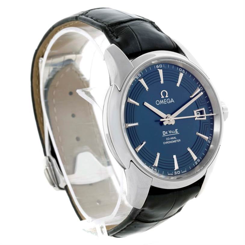 The image shows an angled view of the Omega De Ville 431.33.41.21.03.001 Men's Stainless Steel Blue Dial 431.33.41.21.03.001 Men's Stainless Steel Blue Dial watch, highlighting its blue dial and black leather strap.