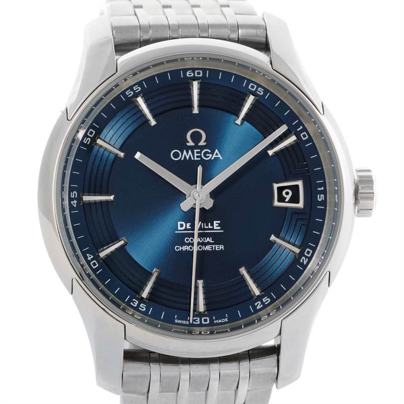 The image shows a front view of the Omega De Ville 431.33.41.21.03.001 Men's Stainless Steel Blue Dial 431.33.41.21.03.001 Men's Stainless Steel Blue Dial watch, highlighting its blue dial, date window, and stainless steel bracelet.