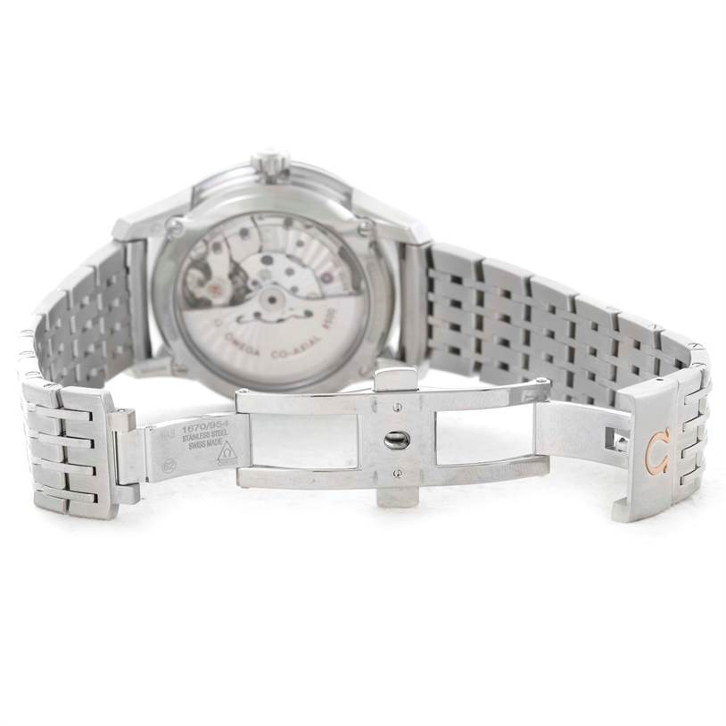 The image shows the back view of an Omega De Ville 431.33.41.21.03.001 Men's Stainless Steel Blue Dial 431.33.41.21.03.001 Men's Stainless Steel Blue Dial watch, focusing on its open clasp and exposed movement.