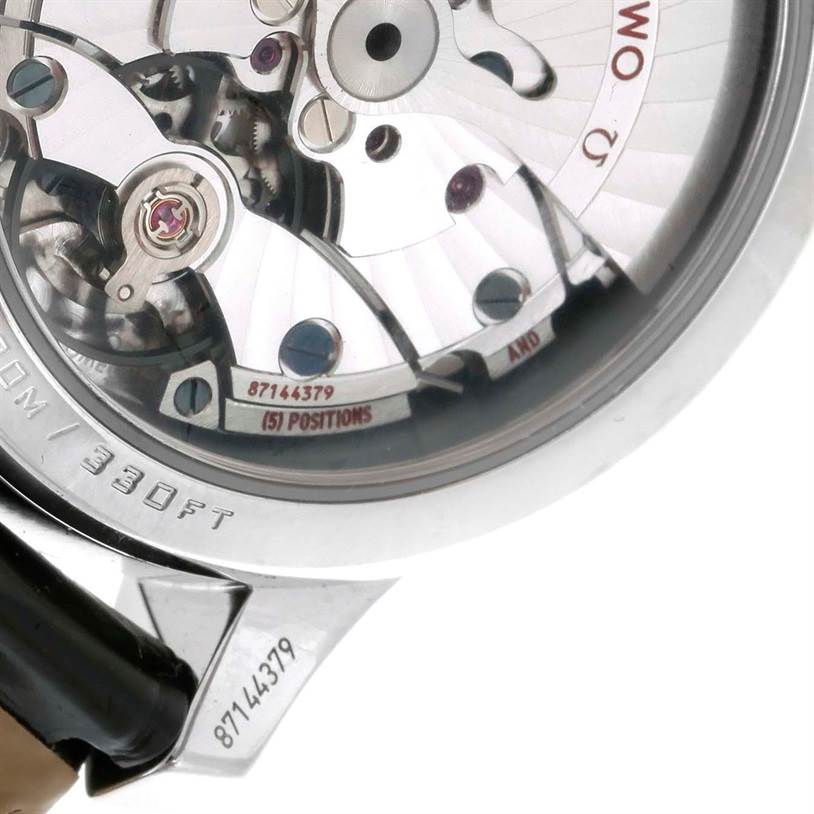 The image shows a close-up view of the Omega De Ville 431.13.41.21.03.001 Men's Stainless Steel Blue Dial 431.13.41.21.03.001 Men's Stainless Steel Blue Dial model's movement and case back details, focusing on the internal mechanism.