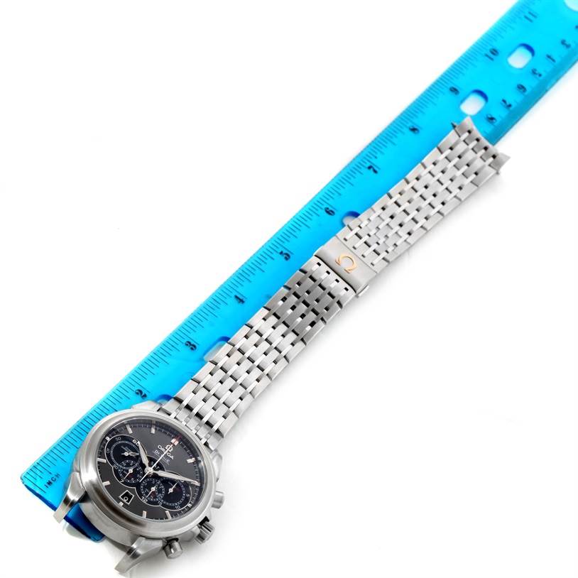 The image shows the face, bracelet, and clasp of the Omega De Ville 422.10.41.52.06.001 Men's Stainless Steel Grey Dial 422.10.41.52.06.001 Men's Stainless Steel Grey Dial watch, positioned next to a ruler for measurement.