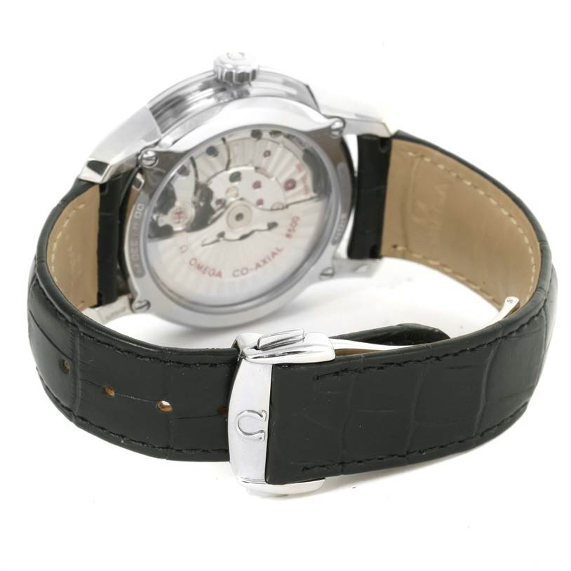 The image shows the back view of an Omega De Ville 431.33.41.21.03.001 Men's Stainless Steel Blue Dial 431.33.41.21.03.001 Men's Stainless Steel Blue Dial watch, highlighting its transparent case back and black leather strap.