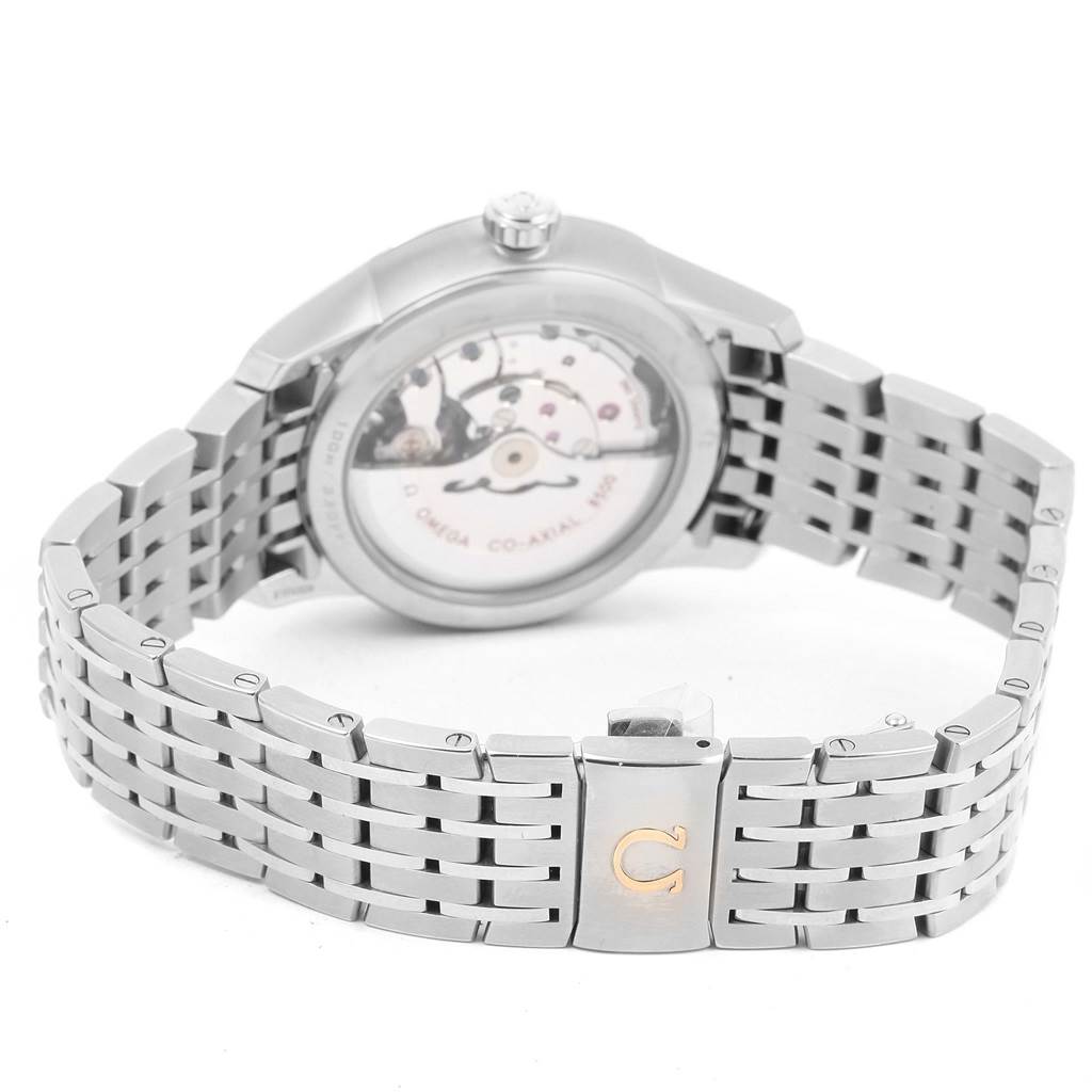 The image shows the back view of the Omega De Ville 431.10.41.21.02.001 Men's Stainless Steel Silver Dial 431.10.41.21.02.001 Men's Stainless Steel Silver Dial watch, highlighting its open case back and stainless steel bracelet with clasp.