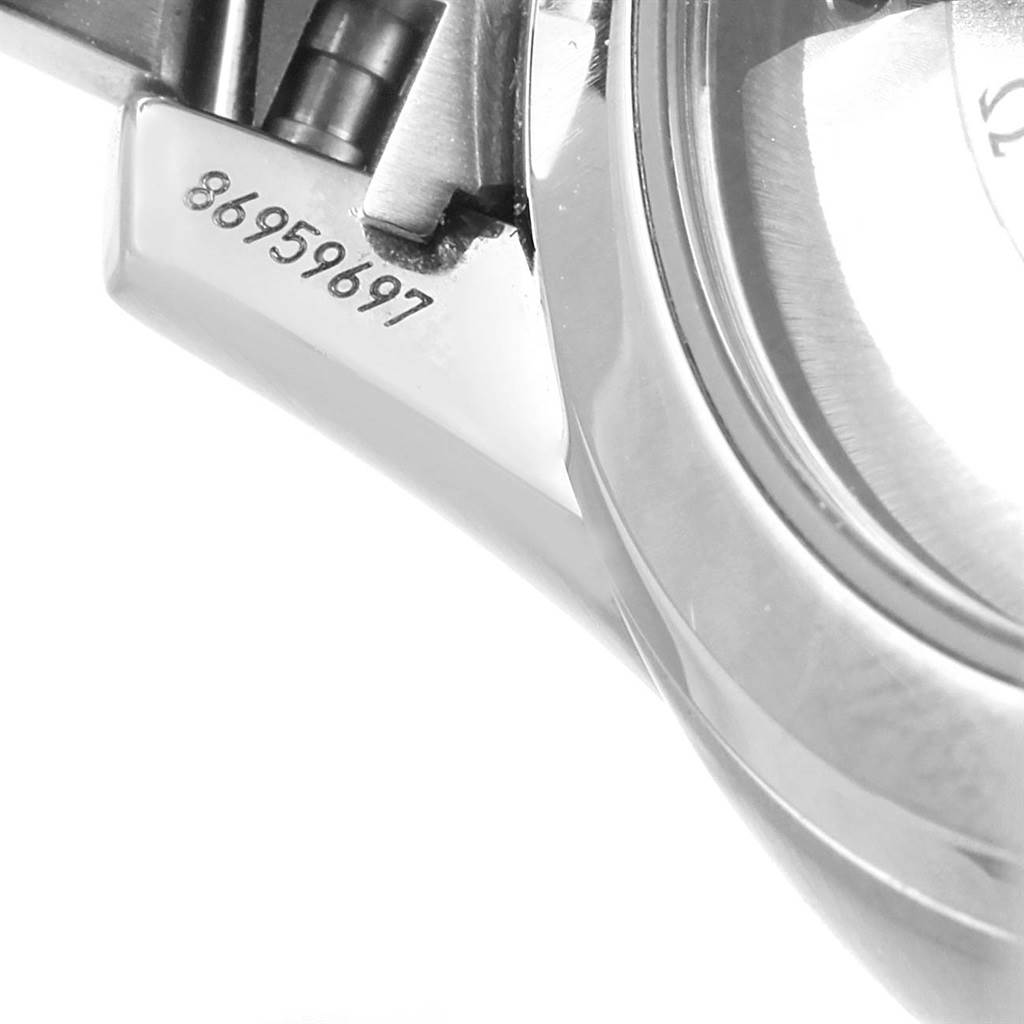 This image shows a close-up of the lugs, serial number, and part of the case of an Omega De Ville 431.10.41.21.03.001 Men's Stainless Steel Blue Dial 431.10.41.21.03.001 Men's Stainless Steel Blue Dial watch.