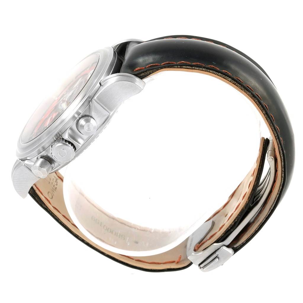 The image shows a side profile of an Omega De Ville 4851.61.31 Men
s Stainless Steel Red Dial 4851.61.31 Men
s Stainless Steel Red Dial watch, highlighting its case, pushers, crown, and leather strap.