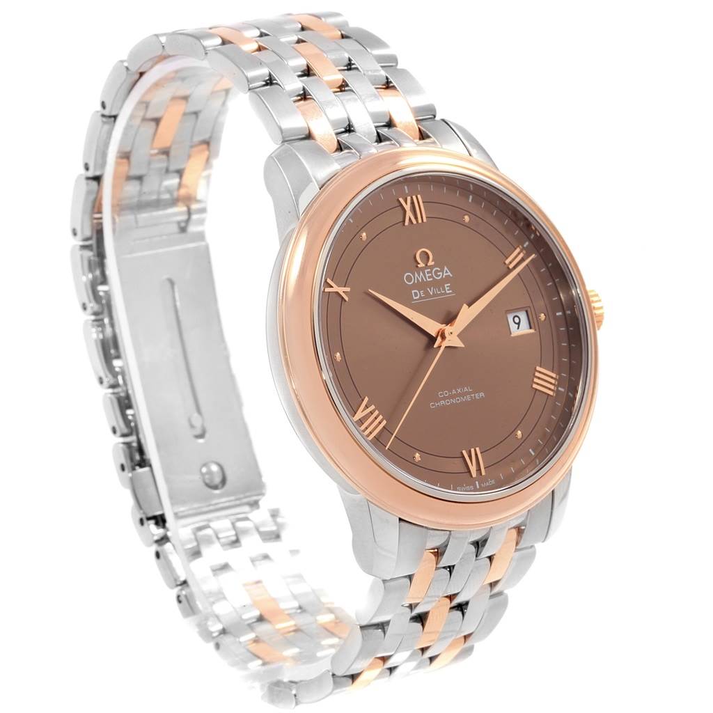The Omega De Ville 424.20.40.20.13.001 Men's Steel and Gold (two tone) Brown Dial 424.20.40.20.13.001 Men's Steel and Gold (two tone) Brown Dial watch is shown at an angle displaying the face, bezel, crown, and part of the bracelet.