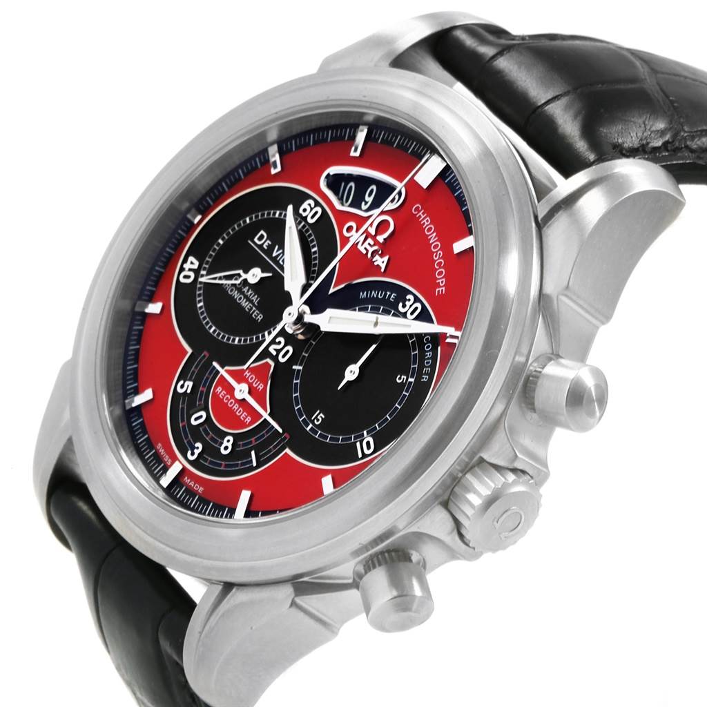 The image shows an angled view of an Omega De Ville 4851.61.31 Men's Stainless Steel Red Dial 4851.61.31 Men's Stainless Steel Red Dial Chronoscope watch, highlighting its face, push-buttons, and part of its leather strap.