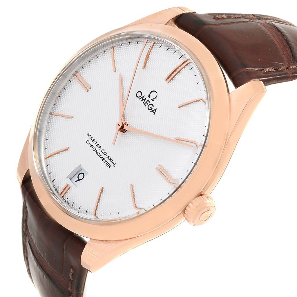 The image shows a side-angle view of the Omega De Ville 432.53.40.21.02.002 Men's Rose Gold Silver Dial 432.53.40.21.02.002 Men's Rose Gold Silver Dial watch, highlighting the face, crown, and leather strap.