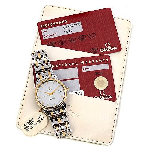The image shows an Omega De Ville 43103200 OR 4310.   32.   00 Men's Yellow Gold White Dial 43103200 OR 4310.   32.   00 Men's Yellow Gold White Dial watch placed on warranty and pictograms cards with an Omega case in the background.