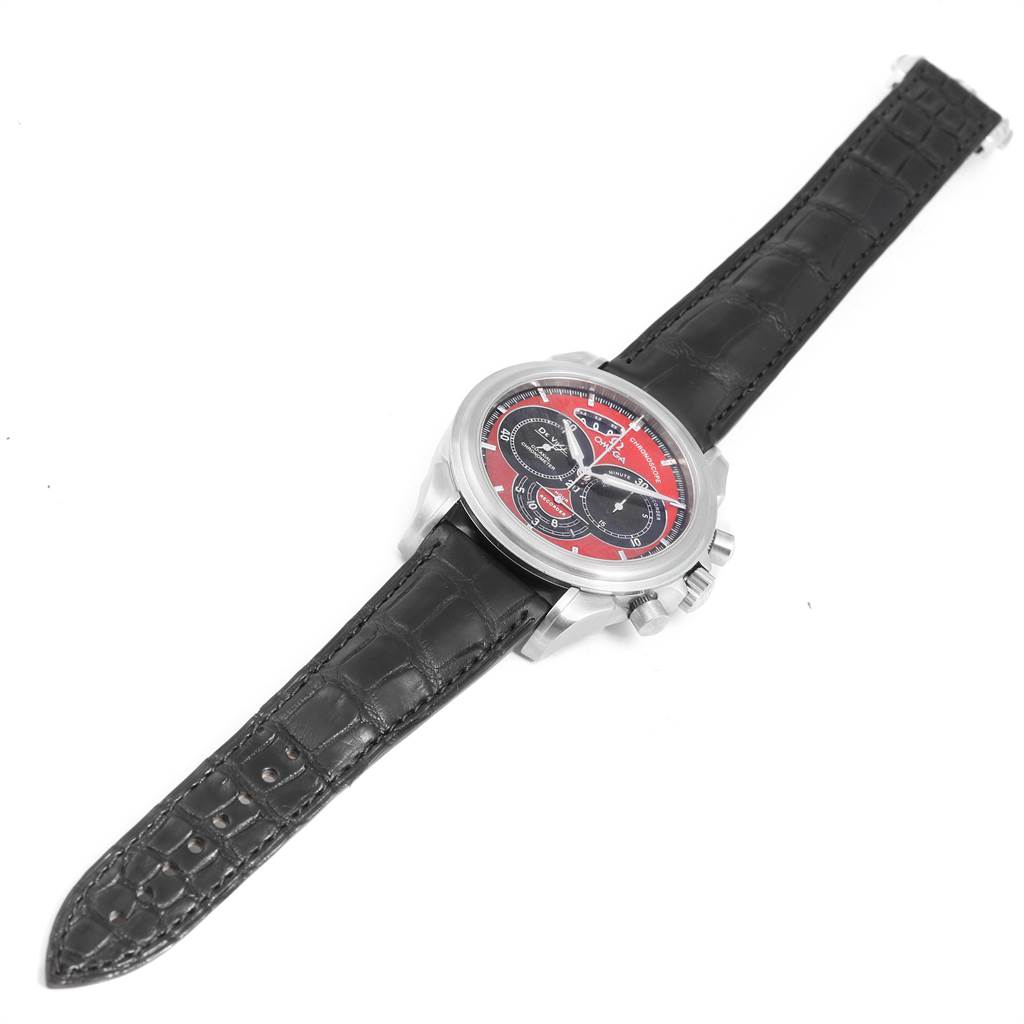 The image shows an Omega De Ville 4851.61.31 Men's Stainless Steel Red Dial 4851.61.31 Men's Stainless Steel Red Dial watch at an angled view, displaying the face, crown, pushers, and leather strap.