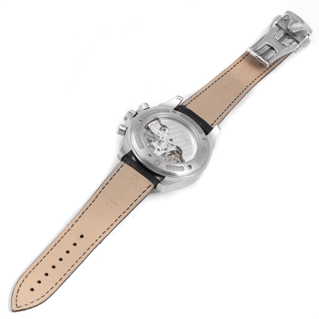 The image shows the back of an Omega De Ville 4851.61.31 Men's Stainless Steel Red Dial 4851.61.31 Men's Stainless Steel Red Dial watch, revealing the transparent case back and leather strap.