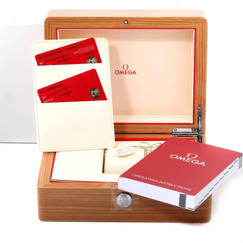 The image shows the packaging and accessories, including warranty cards and instructions, for an Omega De Ville 431.10.42.51.03.001 Men's Stainless Steel Blue Dial 431.10.42.51.03.001 Men's Stainless Steel Blue Dial watch.