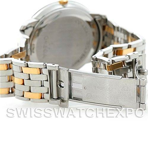 The image shows the back and clasp of an Omega De Ville 4374.15.00 Men
s Steel and Gold (two tone) Champagne Dial 4374.15.00 Men
s Steel and Gold (two tone) Champagne Dial watch, focusing on the two-tone metal bracelet and its deployment clasp.