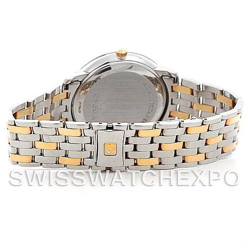 The image shows the back and clasp of the Omega De Ville 4374.15.00 Men
s Steel and Gold (two tone) Champagne Dial 4374.15.00 Men
s Steel and Gold (two tone) Champagne Dial watch, highlighting its two-tone metal bracelet.