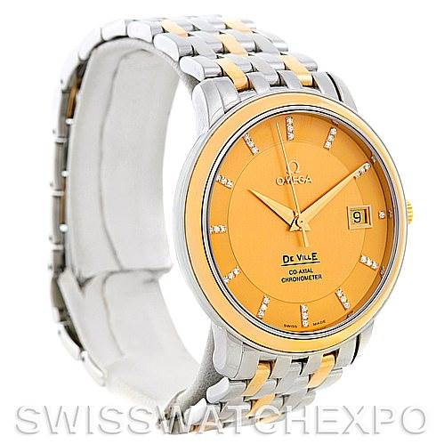 The Omega De Ville 4374.15.00 Men
s Steel and Gold (two tone) Champagne Dial 4374.15.00 Men
s Steel and Gold (two tone) Champagne Dial watch is shown at an oblique angle, displaying the face, hands, bezel, crown, and part of the bracelet.