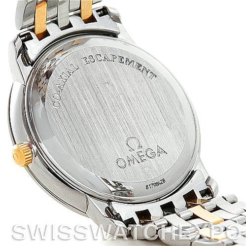 The image shows the back (caseback) of an Omega De Ville 4374.15.00 Men
s Steel and Gold (two tone) Champagne Dial 4374.15.00 Men
s Steel and Gold (two tone) Champagne Dial watch with part of its bracelet.