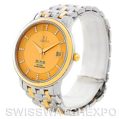 The image shows a side angle of an Omega De Ville 4374.15.00 Men
s Steel and Gold (two tone) Champagne Dial 4374.15.00 Men
s Steel and Gold (two tone) Champagne Dial watch, displaying its face, bezel, band, and crown.