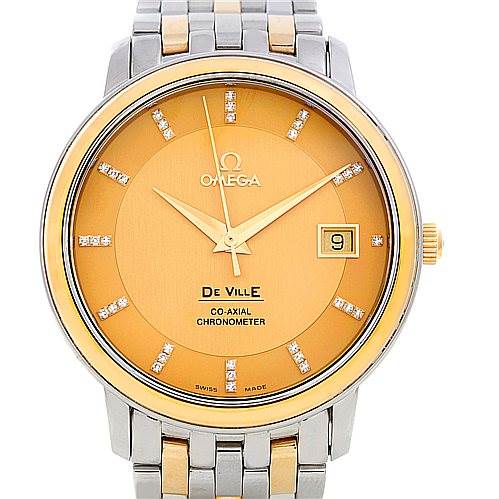 This image shows a frontal view of the Omega De Ville 4374.15.00 Men
s Steel and Gold (two tone) Champagne Dial 4374.15.00 Men
s Steel and Gold (two tone) Champagne Dial watch, featuring its dial, hands, date window, and part of the bracelet.