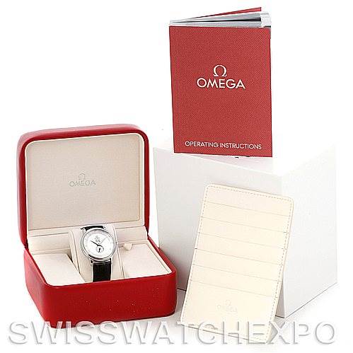 The Omega De Ville 4813.30.01 Men's Stainless Steel Silver Dial 4813.30.01 Men's Stainless Steel Silver Dial watch is shown front view in its open box, accompanied by the operating instructions and authenticity card holder.